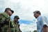 El Presidente Álvaro Uribe Vélez, durante su llegada al aeropuerto de La Macarena, recibe por parte de los  altos mandos militares de esta región un informe preliminar de las acciones en contra del terrorismo que se llevan a cabo en la zona.  