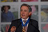 El Presidente Álvaro Uribe Vélez fue condecorado este miércoles con la Orden al Mérito 'Edgard Wells', durante la décima versión de la feria Proflora, que se realizó en Corferias, en Bogotá. Le entrego el reconocimiento el Presidente de la Junta Directiva de Asocoflores, Ernesto Vélez.